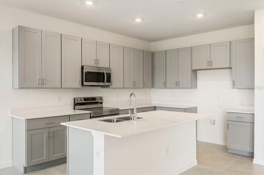 Furnished interior view inside a new home in Mirror Lake Village, Fruitland Park (Image 9).