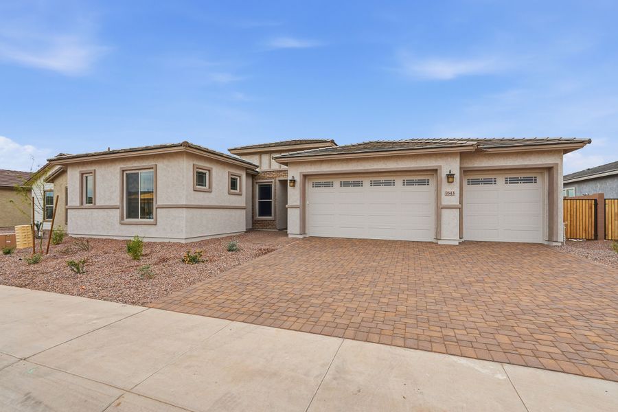Front exterior of a new home in Aloravita South, Peoria, AZ, highlighting curb appeal (Image 22).