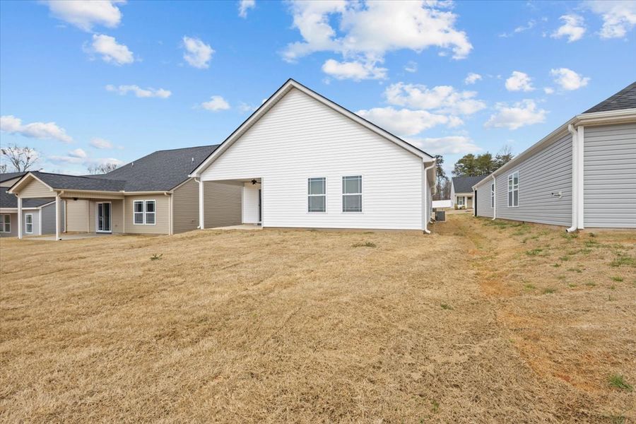 Representative exterior photo of a completed home built from the Ellison by Enchanted Homes in Mills Gin, Campobello, SC (Image 15).