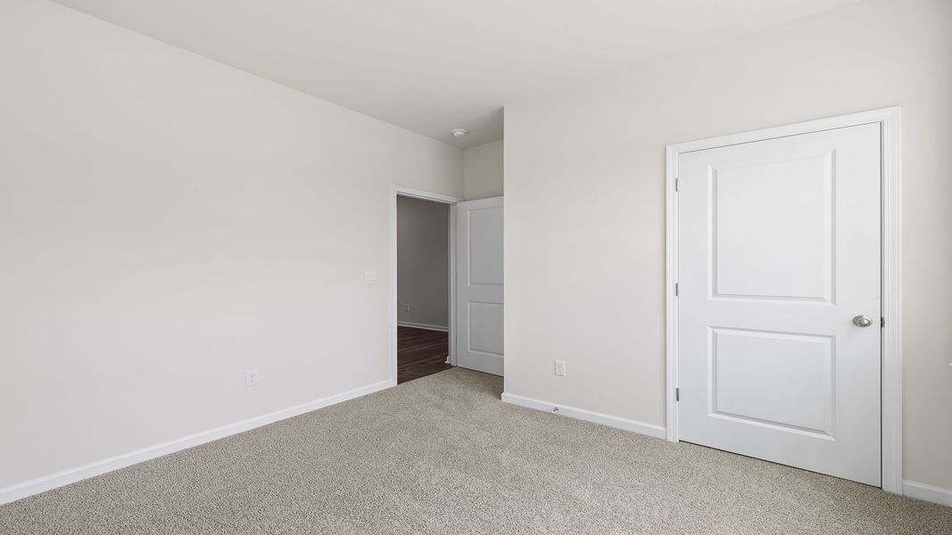 Spacious, unfurnished interior of a new home in Durbin Meadows Traditions, Fountain Inn (Image 14).