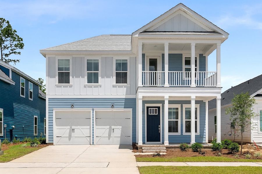 Front exterior of a new home in Midtown at Nexton, Summerville, SC, highlighting curb appeal (Image 1). Front exterior of a new home in Midtown at Nexton, Summerville, SC, highlighting curb appeal (Image 1).