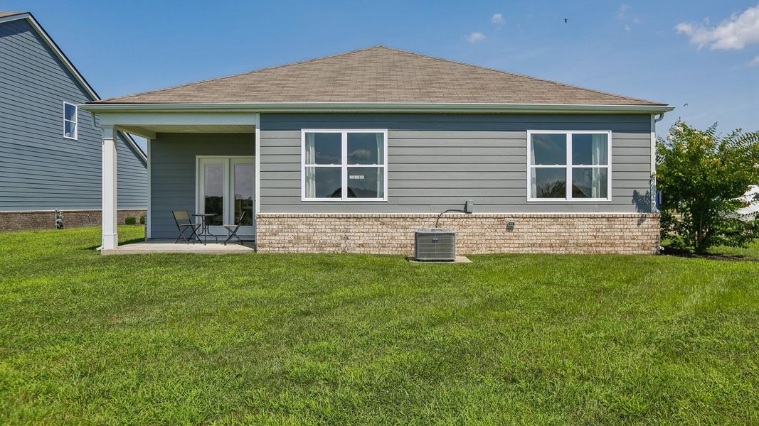 Front exterior of a new home in The Parks, White House, TN, highlighting curb appeal (Image 2).