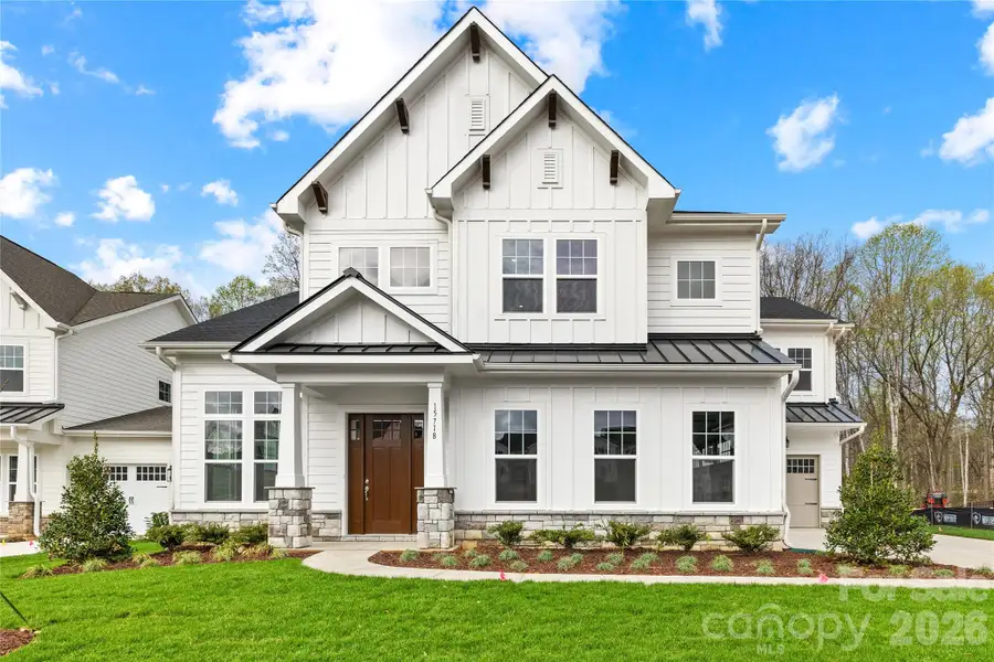Front exterior of a new home in Coventry Glen, Huntersville, NC, highlighting curb appeal (Image 22).
