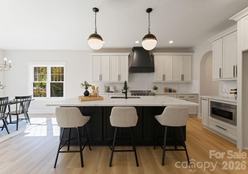 Gourmet Kitchen with Large Island & Stainless Steel Appliances