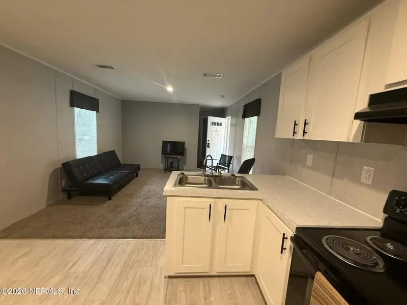 Furnished interior view inside a new home in , Florahome (Image 5).