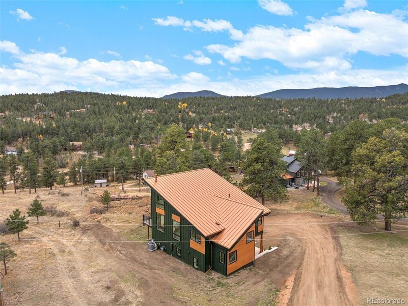 Front exterior of a new home in , Bailey, CO, highlighting curb appeal (Image 29).
