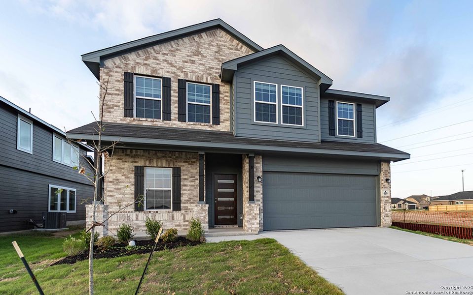Front exterior of a new home in Hannah Heights, Seguin, TX, highlighting curb appeal (Image 2).