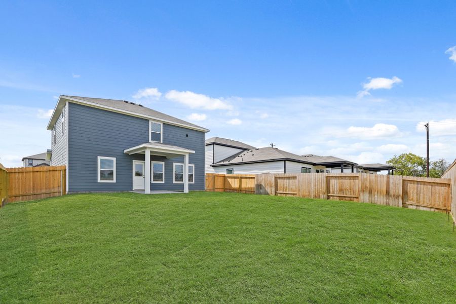 A house with a fence around it.
