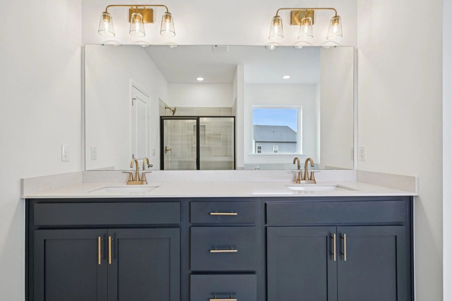 Primary Bath featuring the AW Collection® Sapphire - Clean white and cool hues define the space.