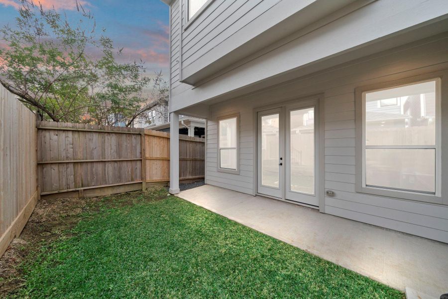 Exterior details and patio area of a home in , Houston (Image 2). Exterior details and patio area of a home in , Houston (Image 2).