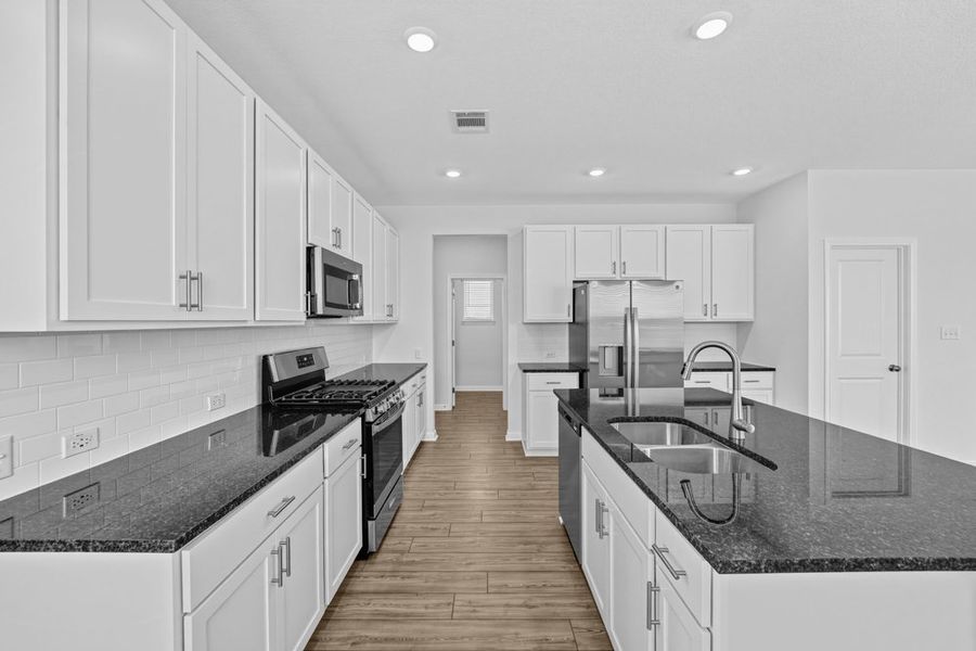 Furnished interior view inside a new home in Sunfield, Buda (Image 8).