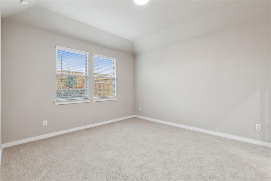 Primary suite in the Elm home plan by Trophy Signature Homes – REPRESENTATIVE PHOTO