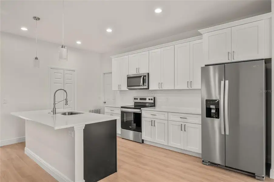 Furnished interior view inside a new home in , Osteen (Image 8).