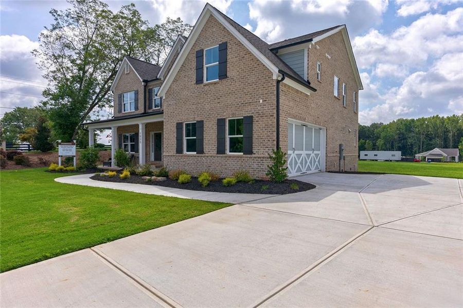 Front exterior of a new home in , Watkinsville, GA, highlighting curb appeal (Image 30).
