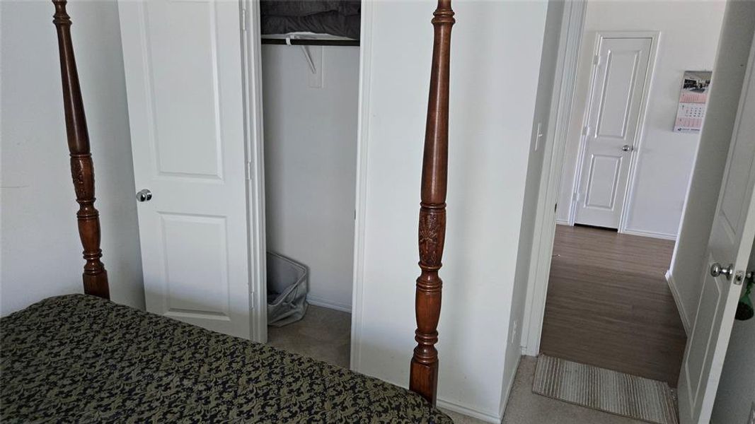 Room interior featuring white walls and a carpeted floor