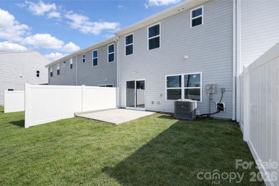 Exterior details and patio area of a home in , Charlotte (Image 3). Exterior details and patio area of a home in , Charlotte (Image 3).
