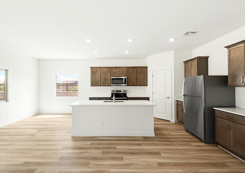 Enjoy preparing your favorite meals in this spacious kitchen.