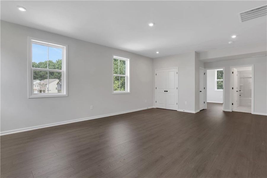 Spacious, unfurnished interior of a new home in The Paddocks at Doc Hughes, Buford (Image 29). Spacious, unfurnished interior of a new home in The Paddocks at Doc Hughes, Buford (Image 29).