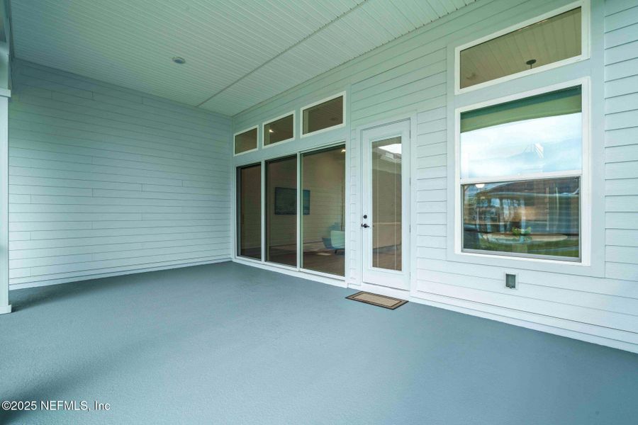 Exterior details and patio area of a home in Seven Pines 50' Rear Entry, Jacksonville (Image 33).