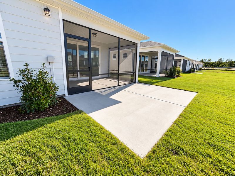 Exterior details and patio area of a home in Del Webb Wilmington at Mallory Creek, Leland (Image 4).