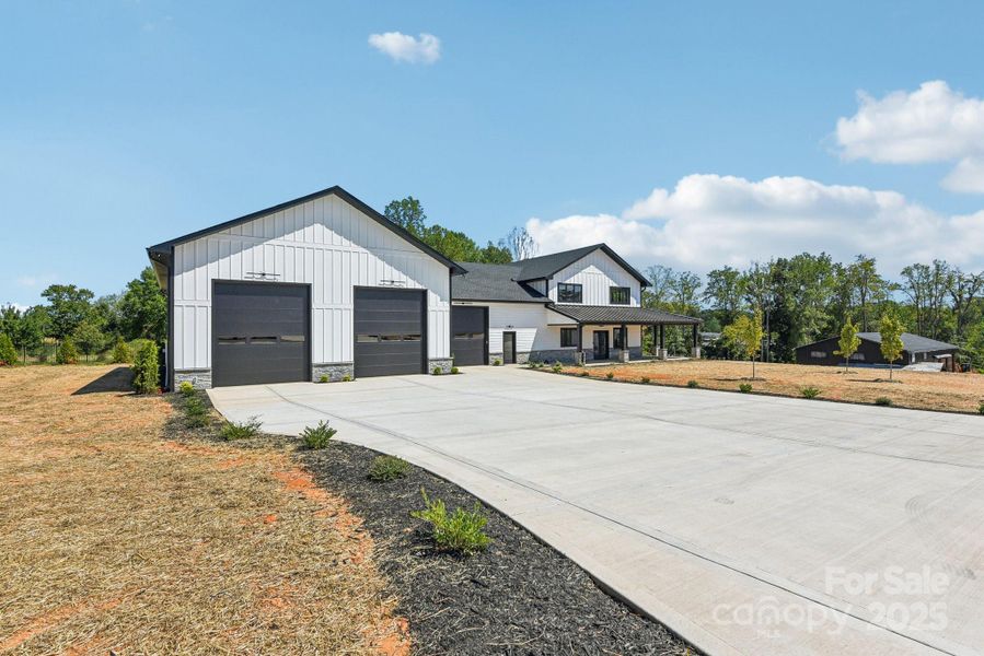 Front exterior of a new home in , Mooresville, NC, highlighting curb appeal (Image 26). Front exterior of a new home in , Mooresville, NC, highlighting curb appeal (Image 26).