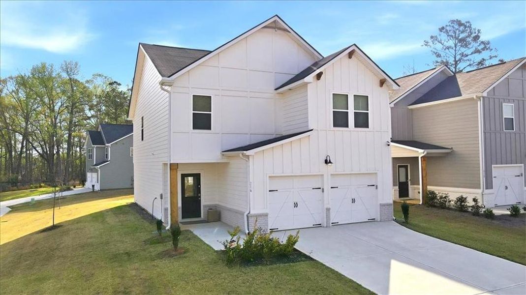 Front exterior of a new home in , McDonough, GA, highlighting curb appeal (Image 23).