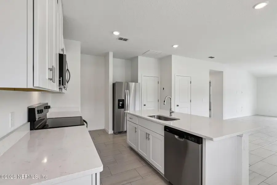 Furnished interior view inside a new home in Cypress Meadows - Classic Series, Jacksonville (Image 4).