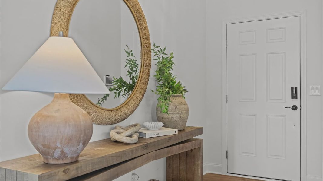 Wynwood home plan front entry hallway and entry table Wynwood home plan front entry hallway and entry table