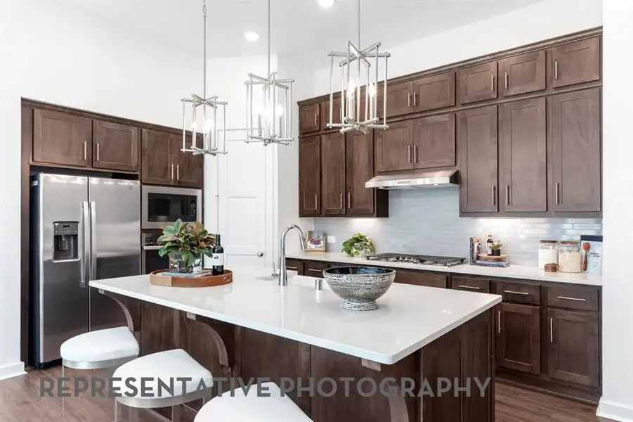 Furnished interior view inside a new home in Wildridge, Oak Point (Image 7).