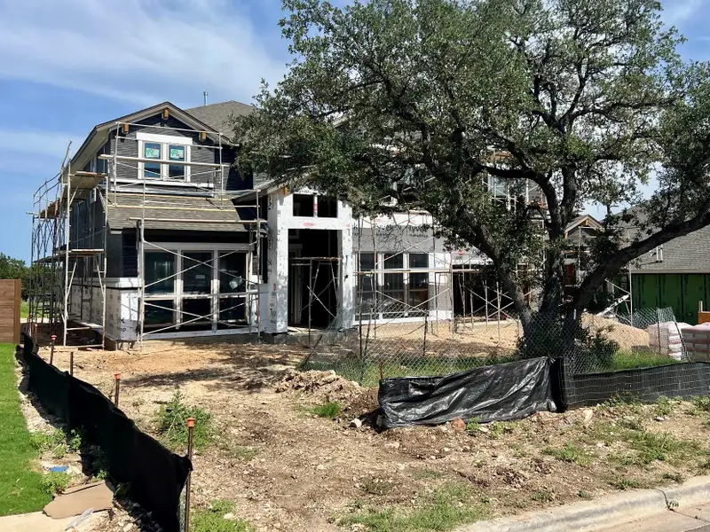 Front exterior of a new home in Riverstone, Georgetown, TX, highlighting curb appeal (Image 2). Front exterior of a new home in Riverstone, Georgetown, TX, highlighting curb appeal (Image 2).