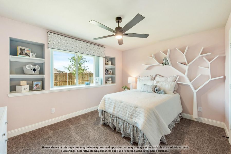 Children's bedroom with pink walls, built-in shelves, tree wall decor, and ceiling fan