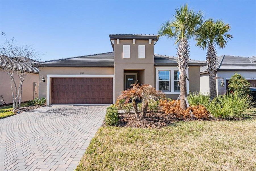 Front exterior of a new home in , San Antonio, FL, highlighting curb appeal (Image 26).
