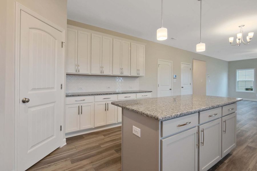 Representative furnished interior of a home built from the Drayton by Caviness & Cates Communities in Bartlett Manor, Youngsville (Image 163).