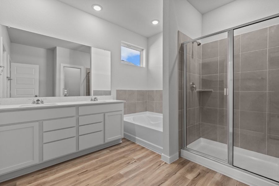A bathroom with a glass shower.