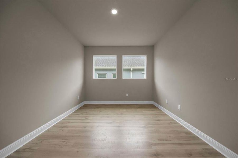 Spacious, unfurnished interior of a new home in Eagle Creek - Garden Series, Tarpon Springs (Image 32).