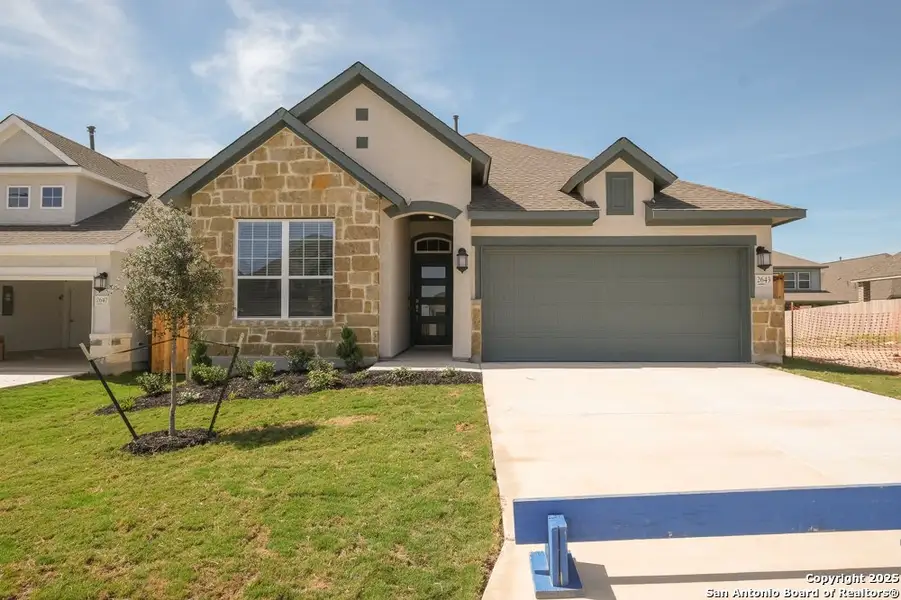 Front exterior of a new home in , San Antonio, TX, highlighting curb appeal (Image 2).