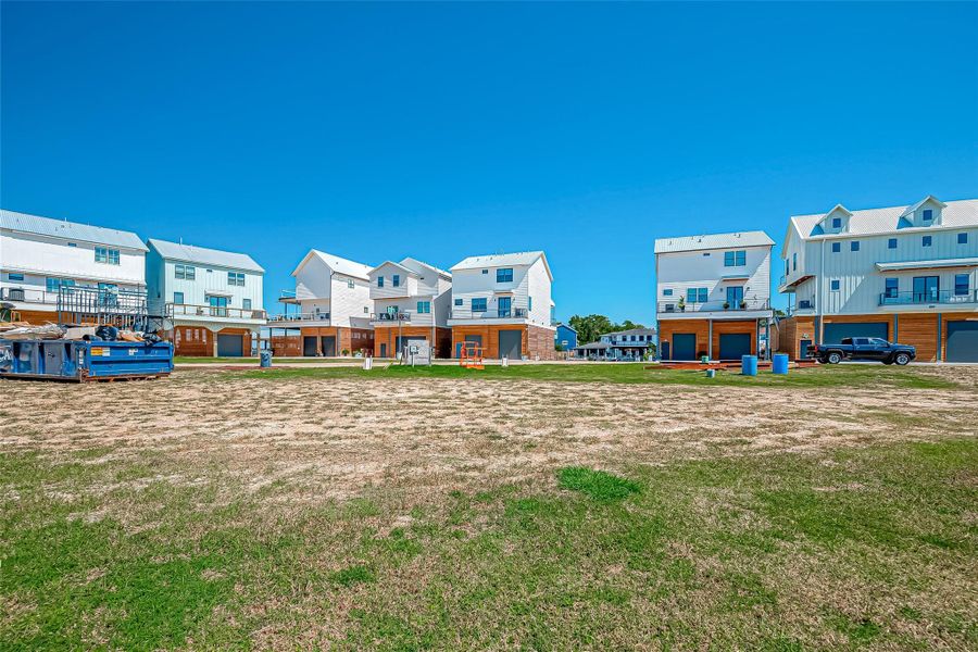 Front exterior of a new home in , Taylor Lake Village, TX, highlighting curb appeal (Image 6).