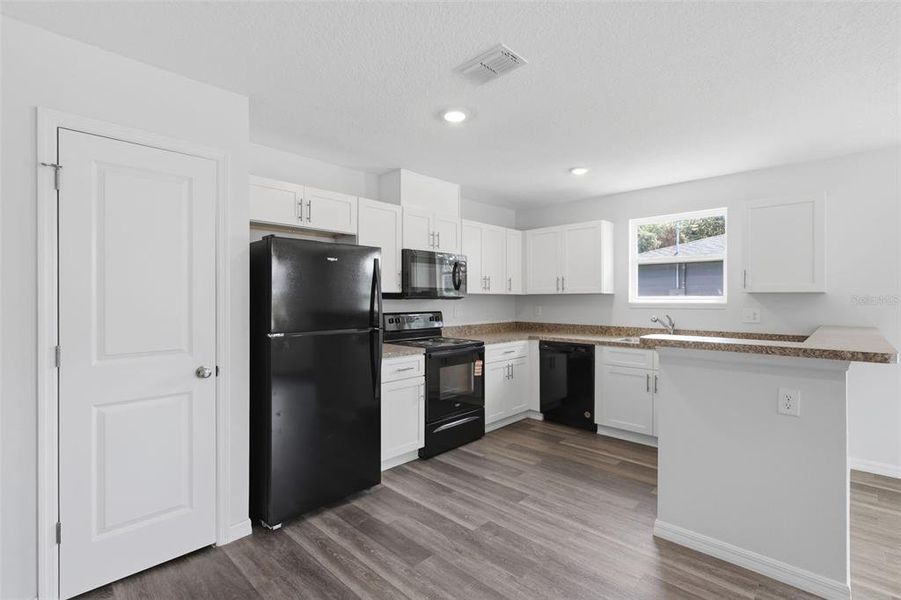 Furnished interior view inside a new home in , Apopka (Image 5).