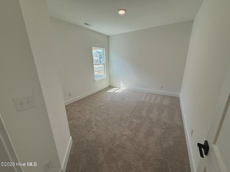 Spacious, unfurnished interior of a new home in Wood Creek Landing, Leland (Image 14).