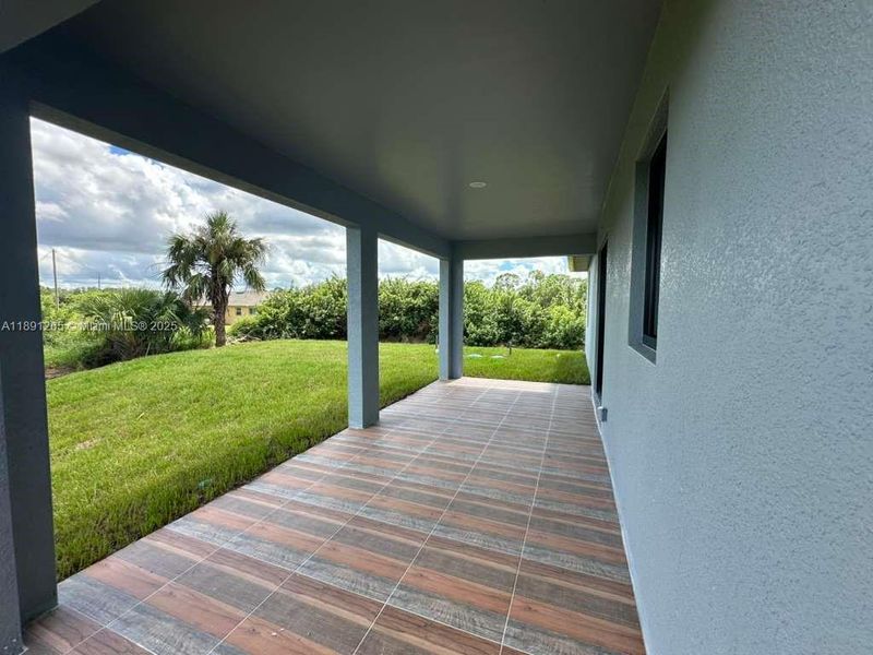 Exterior details and patio area of a home in , Lehigh Acres (Image 1).