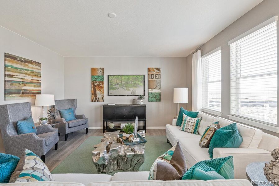 Furnished interior view inside a new home in Trails at Crowfoot, Parker (Image 7).