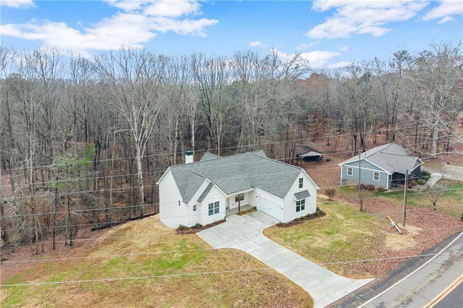 Front exterior of a new home in , Waleska, GA, highlighting curb appeal (Image 2). Front exterior of a new home in , Waleska, GA, highlighting curb appeal (Image 2).