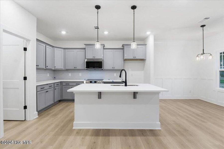 Furnished interior view inside a new home in Wood Creek Landing, Leland (Image 5).