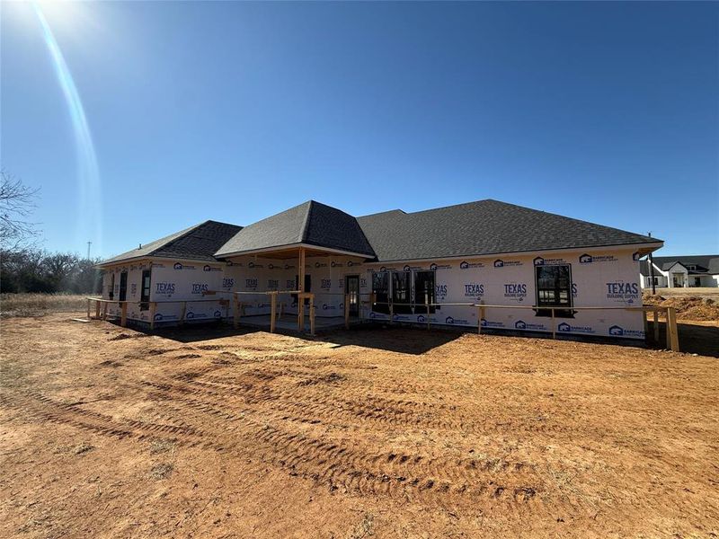 In-progress construction of a new home in Freeman Ranch, Weatherford, TX (Image 9).