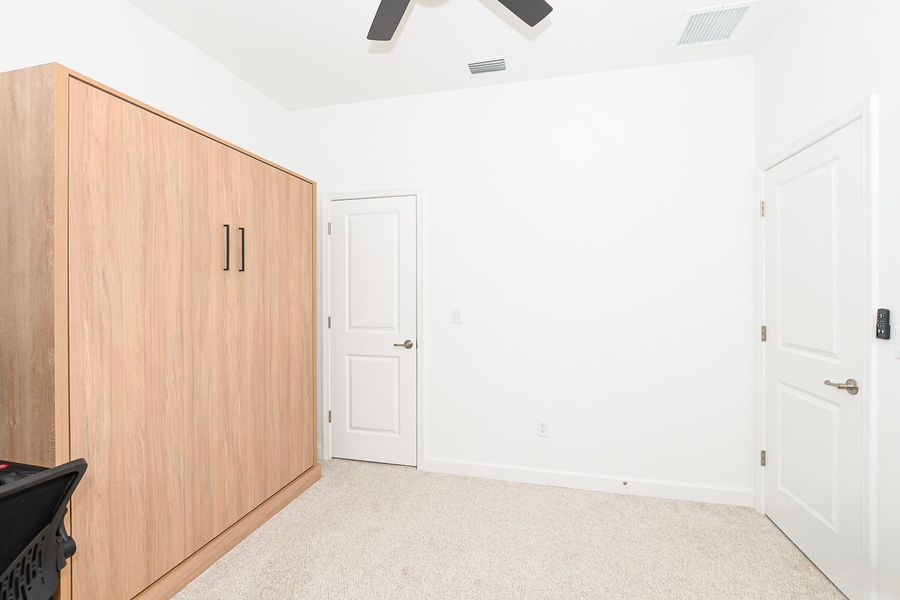 Furnished interior view inside a new home in , Port St. Lucie (Image 35).