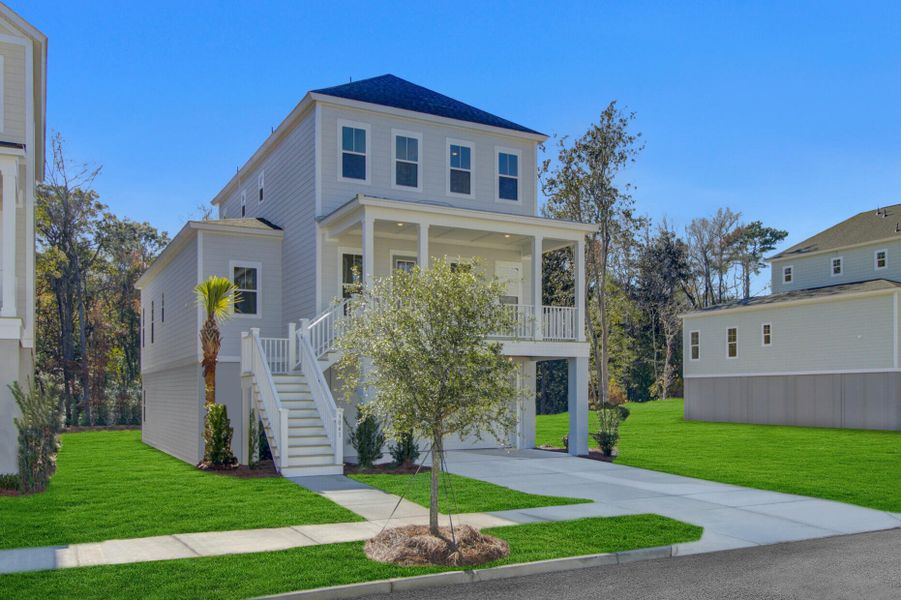 Front exterior of a new home in Indigo Grove Single Family Homes, Johns Island, SC, highlighting curb appeal (Image 2).
