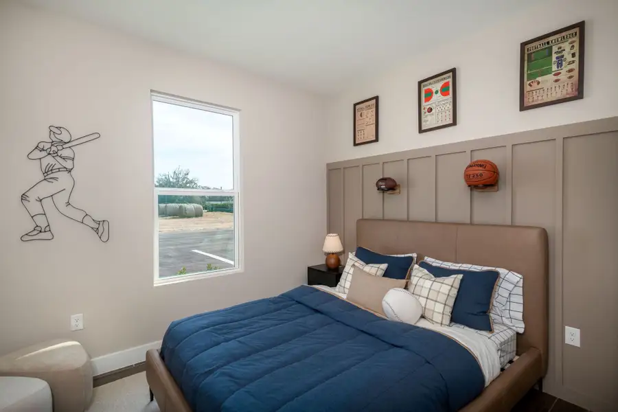 A cozy secondary bedroom with abundant natural light and a versatile layout perfect for guests, children, or a personal retreat. A cozy secondary bedroom with abundant natural light and a versatile layout perfect for guests, children, or a personal retreat.