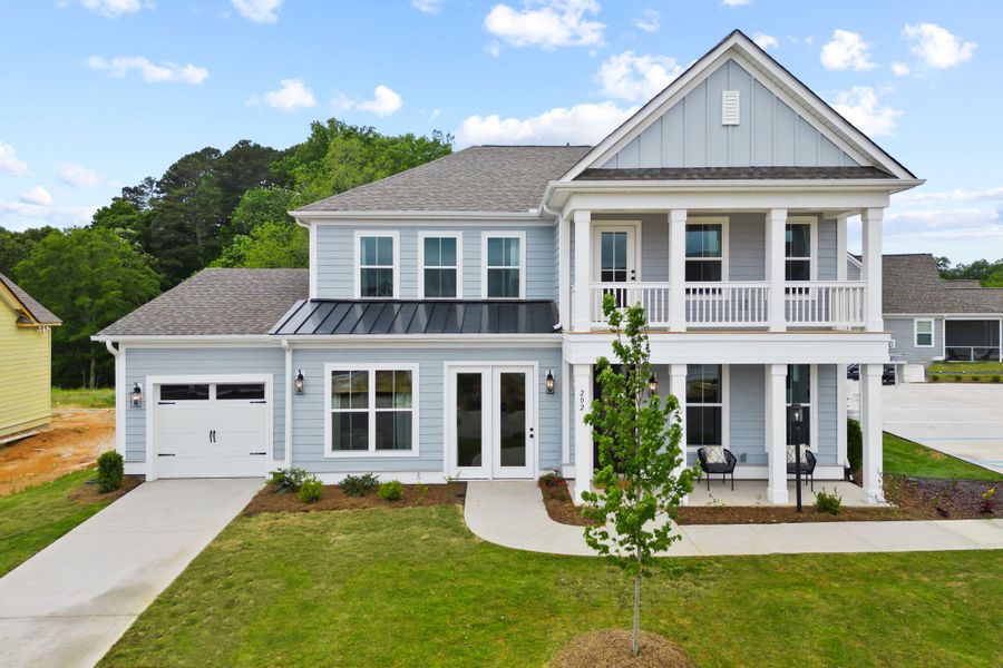 Front exterior of a new home in Phillips Crossing, Ridgeville, SC, highlighting curb appeal (Image 30).