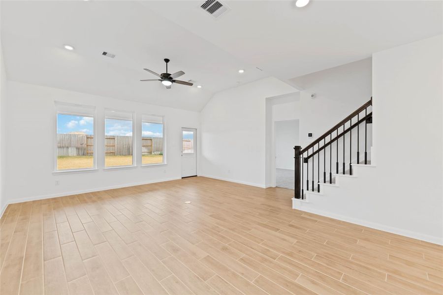 Spacious, unfurnished interior of a new home in Sunterra, Katy (Image 20).