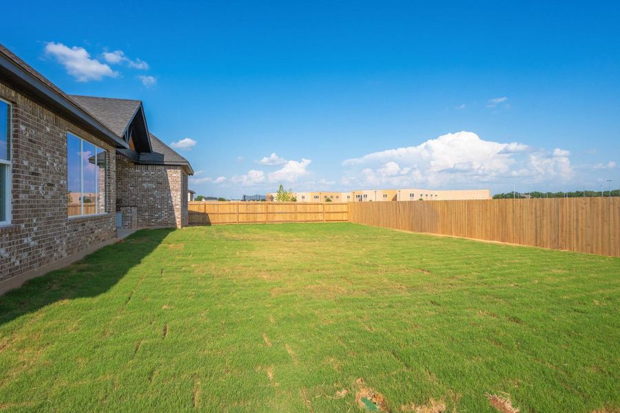 Exterior details and patio area of a home in , College Station (Image 26).